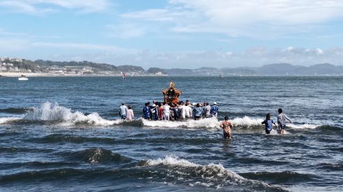 the group carries the tomb to the sea to purify the sacred spirit