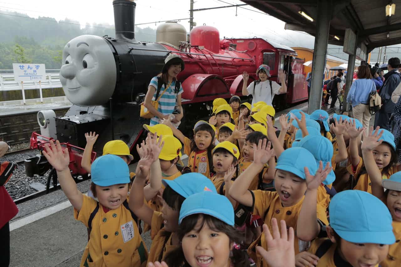 children are excited to ride with Thomas the train in Shizuoka Oigawa Railway in Japan