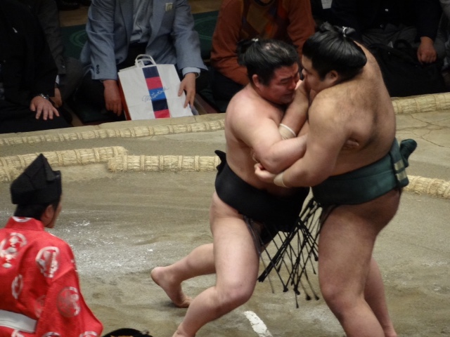 A Sumo tournament in Japan. Sumo is a famous sport in Japanese tradition.