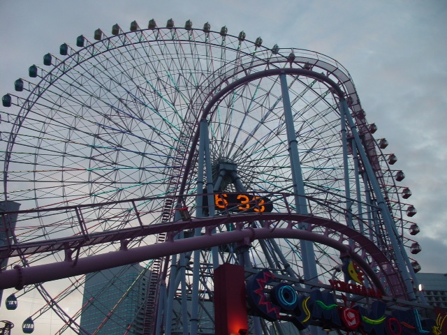 roller coaster and ferris wheel in Yokohama.