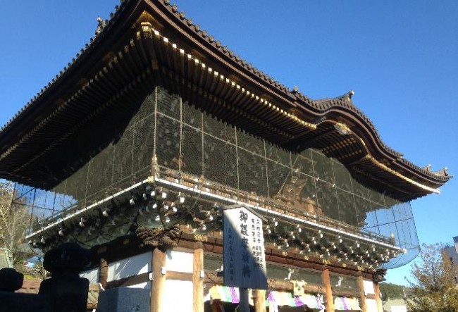 A temple roof among narita-san temple grounds, during Hatsumōde New Year visit, Narita