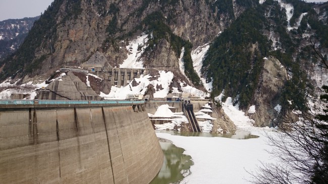 Japan's largest dam, Kurobe dam, located in the Alpine Route surrounded by mountains