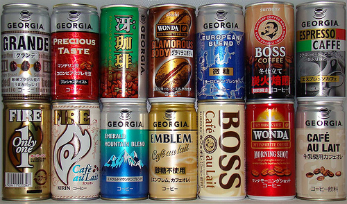 Different brands of coffee in aluminum cans. These are commonly seen in vending machines and are available hot or cold. 