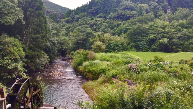 River near Chigonotaki waterfall with lots of nature in the distance in Kagoshima.