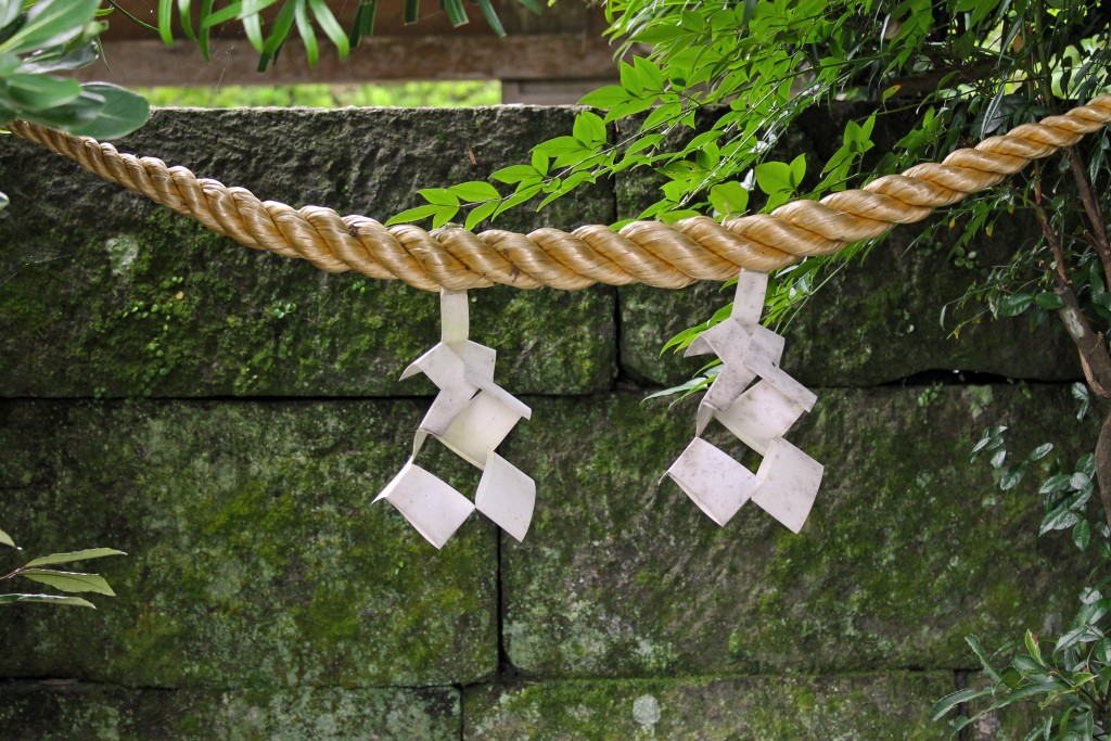 Good luck charms hanging from a rope at the heritage samurai village of Chiran.