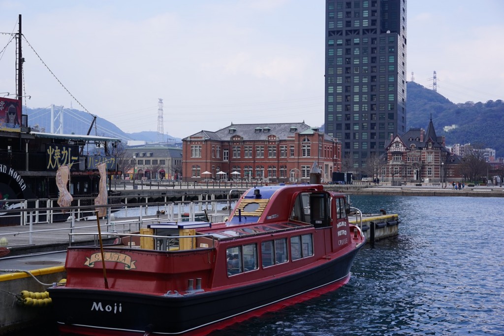 Walk at Mojiko Port: Blue Wing Moji and Red Brick Buildings