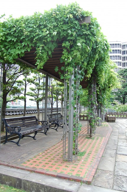 sheltered resting spot with benches in Dejima island, Nagasaki