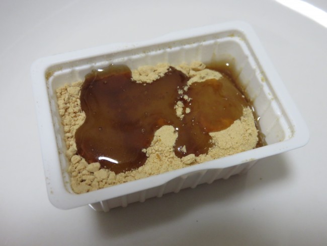 Tsukushi mochi, a kind of Japanese sweet from Fukuoka, covered in dark honey flavoured with brown sugar