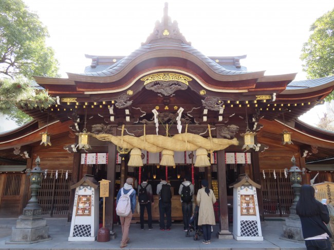 Kushida shrine adorned by shimenawa, a downtown Fukuoka shrine