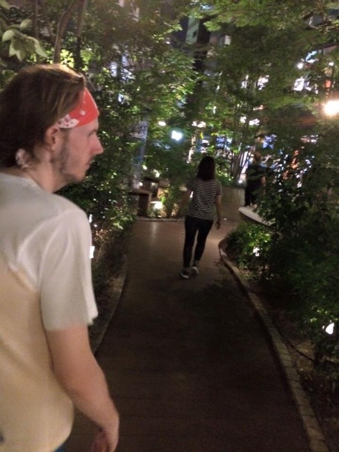 Wandering Canal City Hakata plaza's greenery, lush as Fukuoka's Kyushu environs