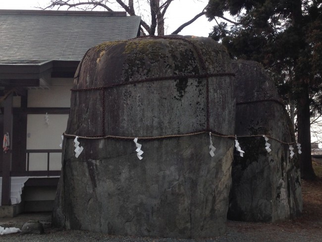 Two giant rocks at a Buddhist temple in Morioka.
