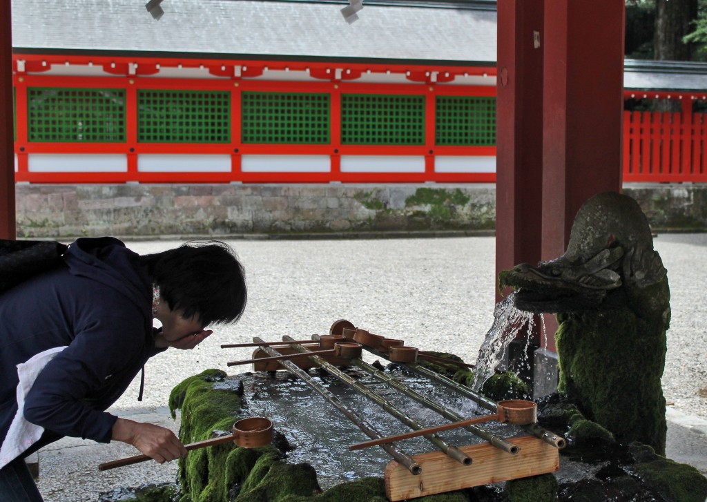 Cleansing area with holy water at Kirishima Jingu Shrine.