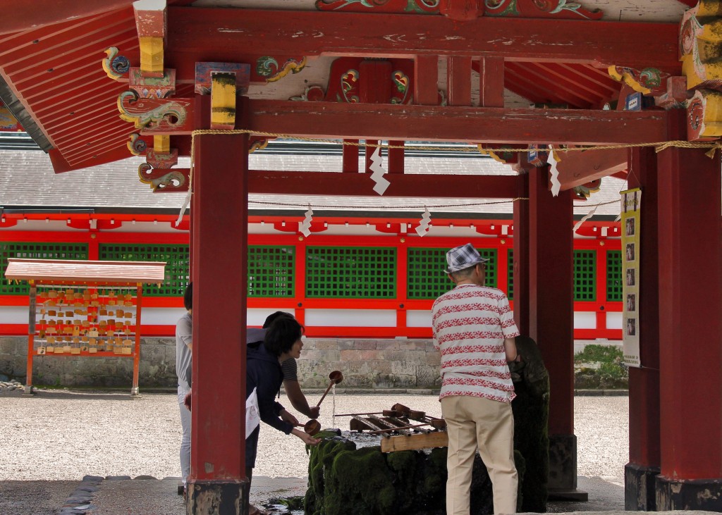 Cleansing area with holy water at Kirishima Jingu Shrine.