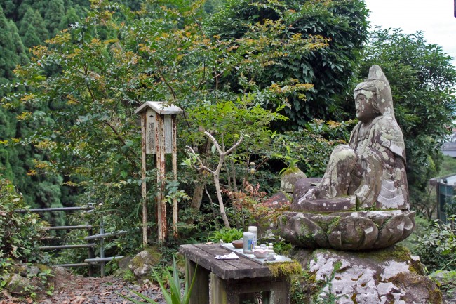 Spiritual statue of Ryumondaki waterfall.