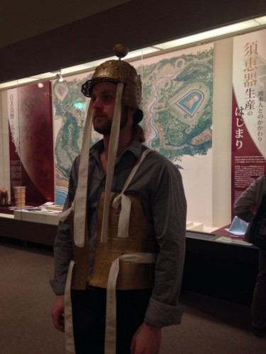 trying on warrior armour in Sakai history museum