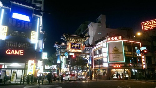 Yokohama Chinatown street decorated in a Chinese fashion with some Chinese signs.
