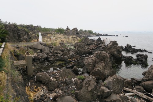 rocky cliffs next to the sea in Sakurajima
