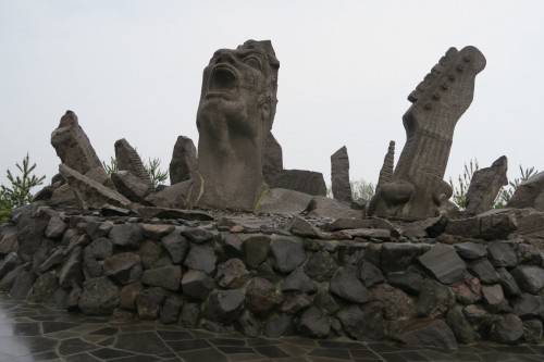 Sakurajima Portrait of a scream close-up, eerie art monument against island calm