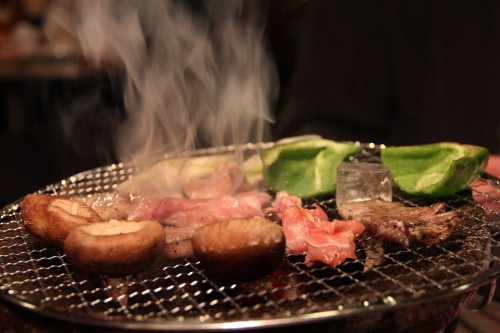 grilling in a yakiniku restaurant