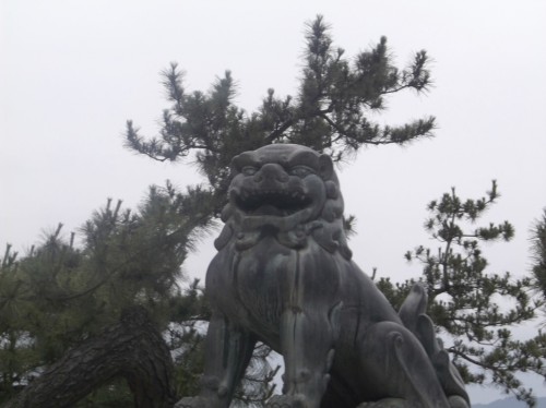 statue in Miyajima Island at the Shrine