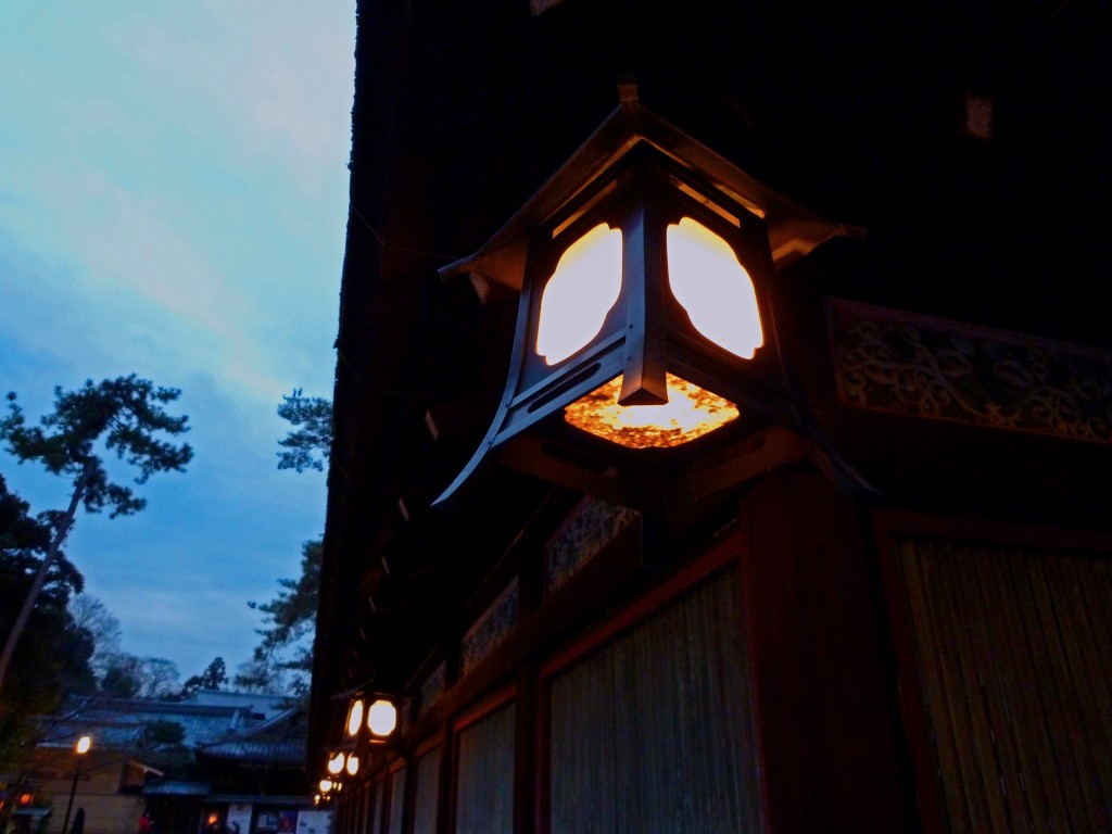 Wooden Lanterns Hanging from one of the buildings at Yakasa Shrine, Kyoto