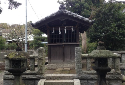 A temple altar along Japanese rickshaw way towards Jufuku-ji Temple, Kamakura temple
