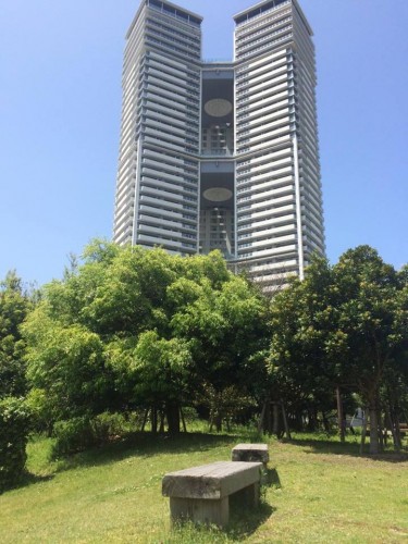 within the park, Fukuoka island city has grand design in buildings