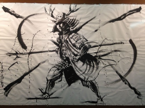 Art dedicated to Osaka Castle that depicts a samurai.