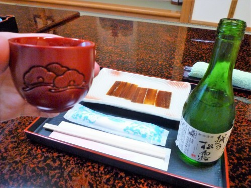 Engraved wooden sake cups at Murakami's Kosugi restaurant.