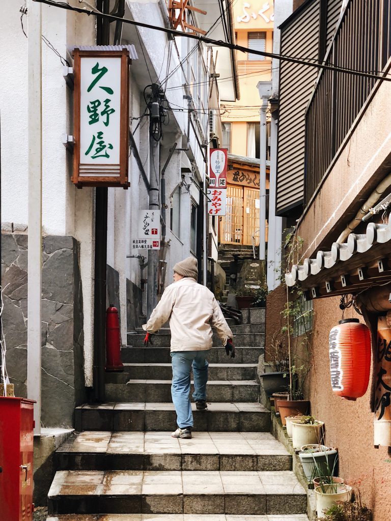 A man going up the street in Tsuetate Onsen