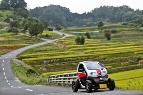 Small electric car called "michimo" passing through the rice fiels of Asuka