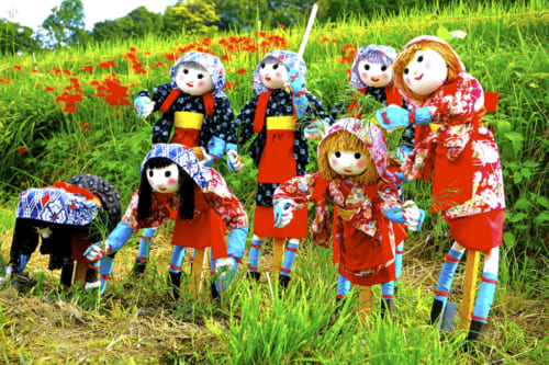Colorful scarecrows in Inabuchi Tanada rice fields in Asuka, Nara