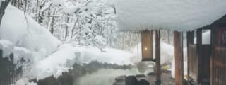 Winter onsen in a forest in Japan